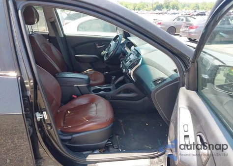 2012 Hyundai Tucson Limited z USA, uszkodzony, nr VIN KM8JU3AC8CU339214